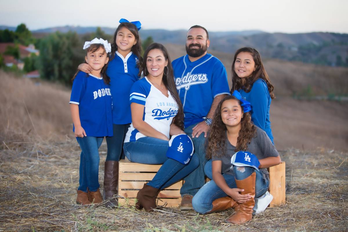 A Group Of Family Posing to a picture